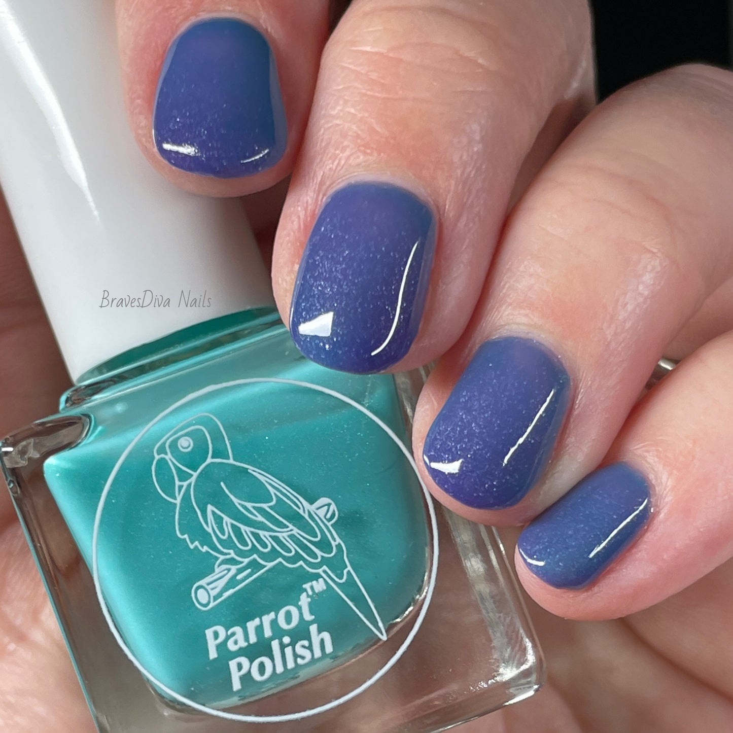 Parrot Polish Blue Daisy Color Changing Solar Nail Lacquer - Light Blue-green/Dark Blue